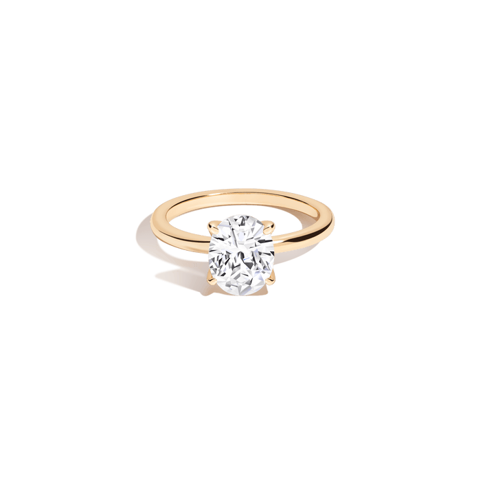 Oval White Sapphire Solitaire Ring