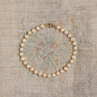 Aurate x Marilyn Monroe: Gold Knot Pearl Bracelet
