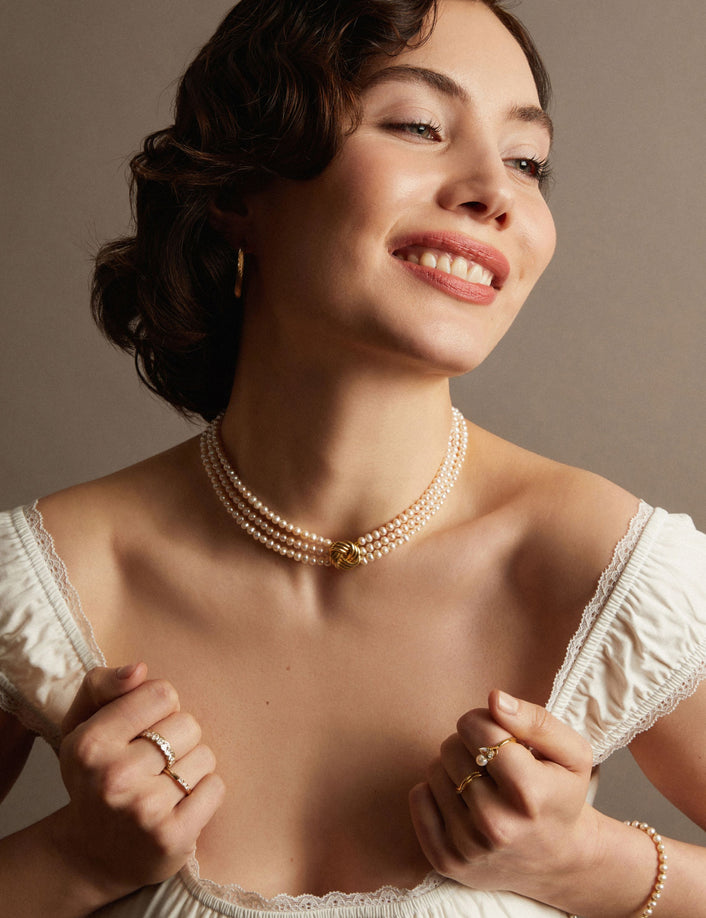 Pearl necklace on woman. Model