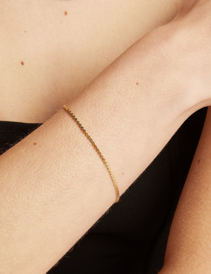 Model. Gold bracelet on a person