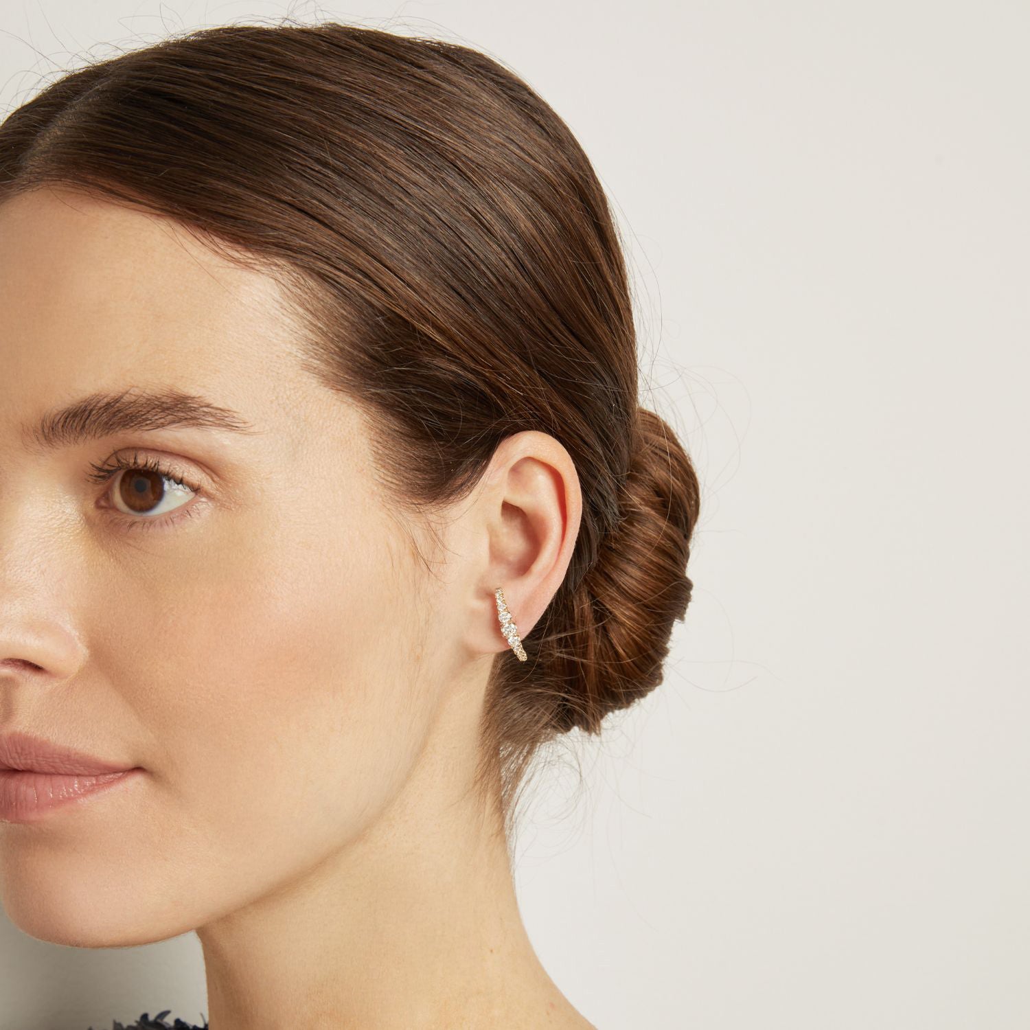 Model. Close up of woman warring hoop earring