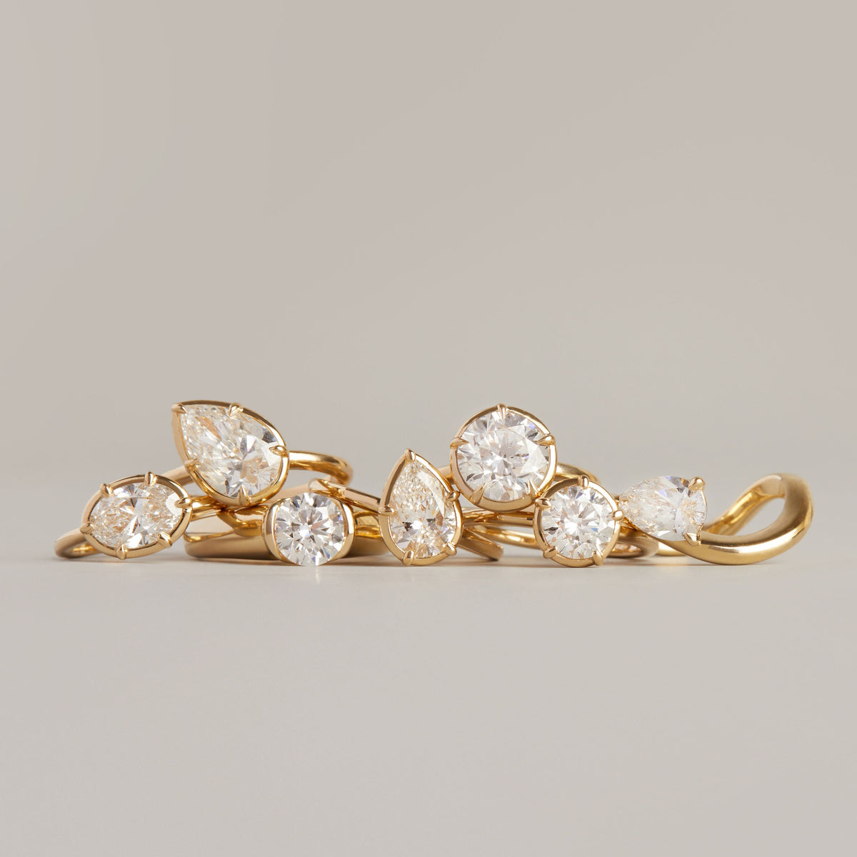 Model. Various diamond rings on a neutral background