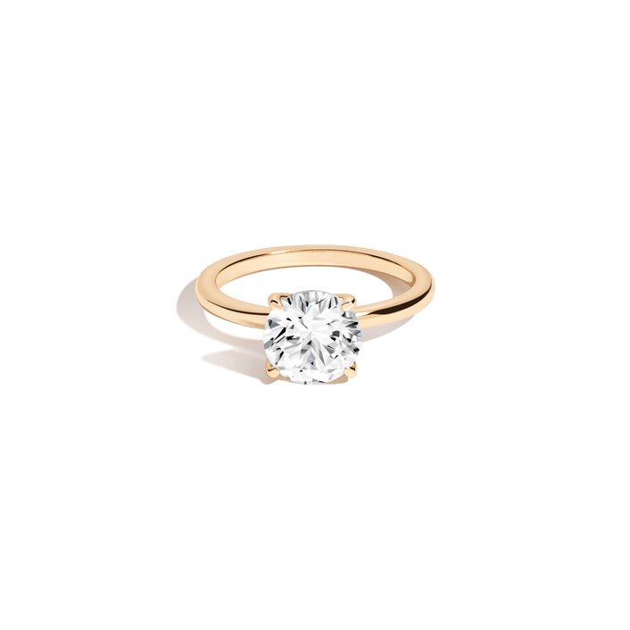 Round White Sapphire Solitaire Ring
