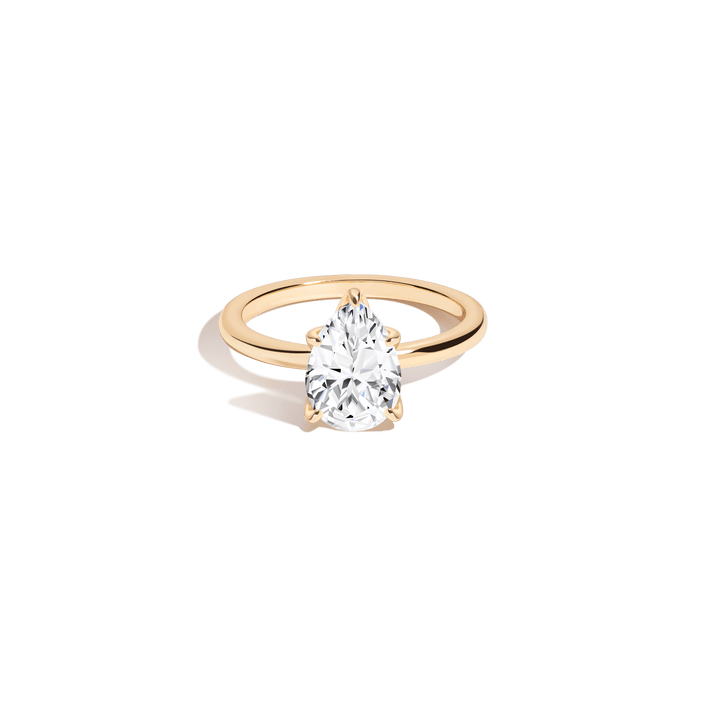 Pear White Sapphire Solitaire Ring
