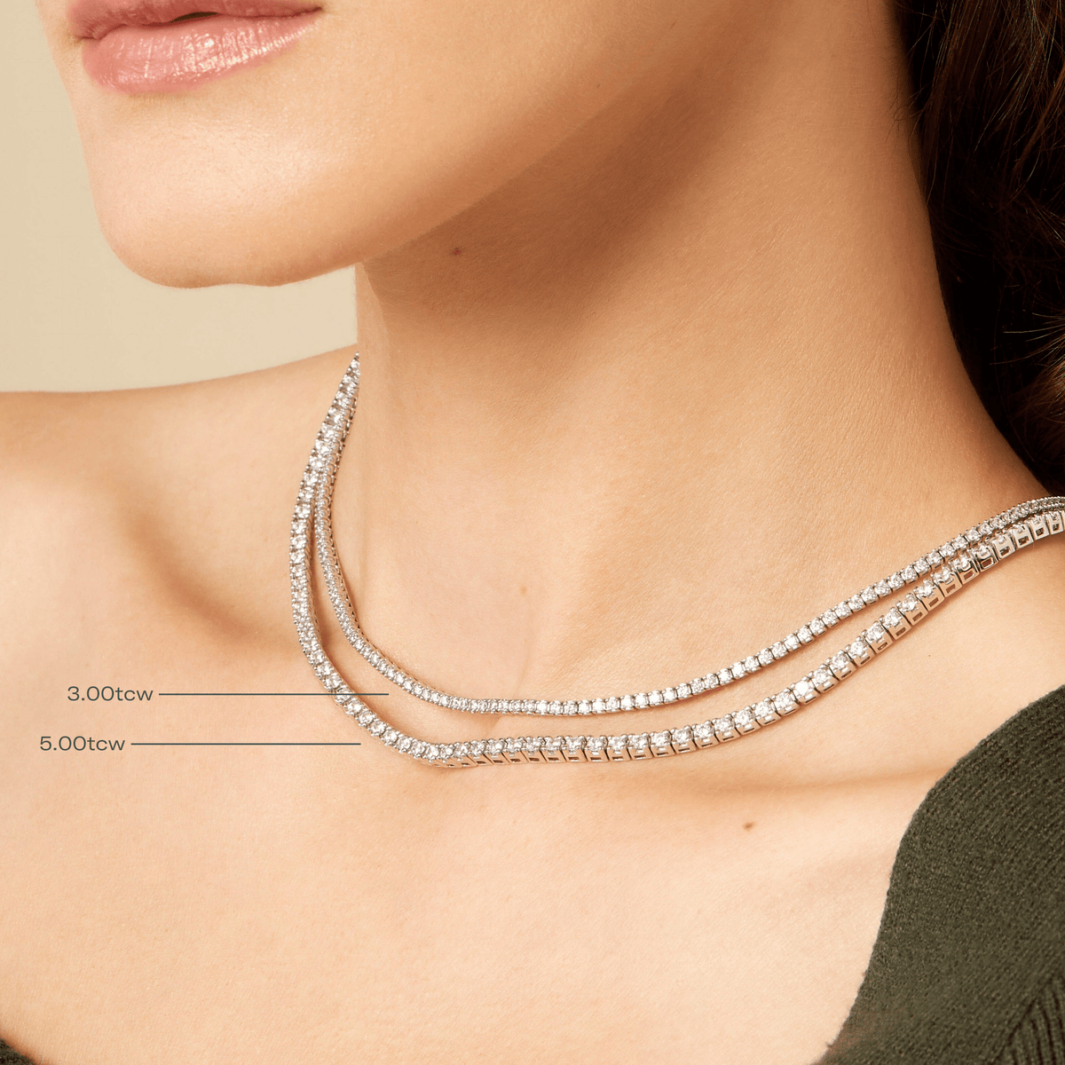 Lifestyle Model. Woman wearing 2 diamond tennis necklaces