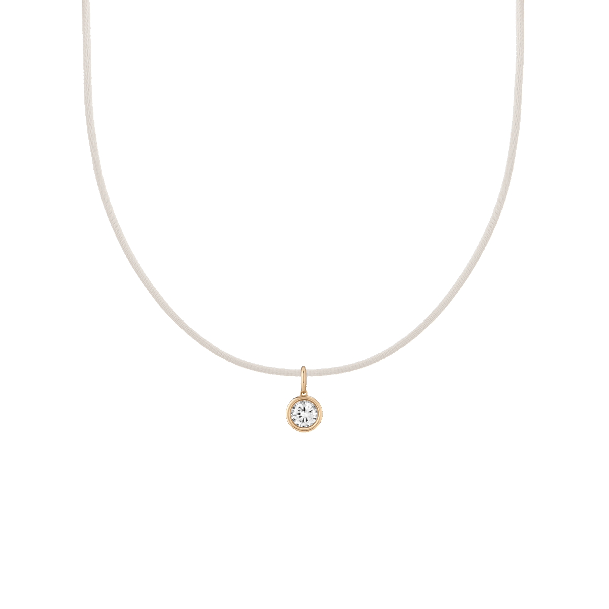 First. Gif of cord necklace with bezel white sapphire charm pendant. 