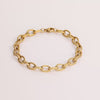 Video of a gold chain bracelet on white background.
