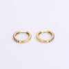 Black Rhodium Huggie Earrings on white background