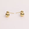 Video of gold ball drop earrings on white background.