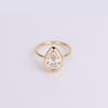 Pear shaped diamond ring on white background 