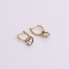 Video of Georgian Drop Huggie Earrings on white background