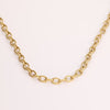 Video of a gold chain necklace on white background.