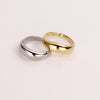 Video of gold and silver ring on white background.