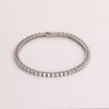 Video of white sapphire tennis bracelet on white background.