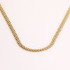 Video of a gold chain necklace on white background.