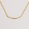 Video of gold necklace on white background.