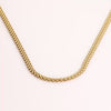 Video of a gold chain necklace on white background.