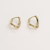 Gold hoop earrings on white background.