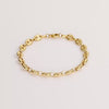 Video of a gold chain bracelet on white background.