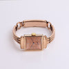 Video of rose gold watch on white background