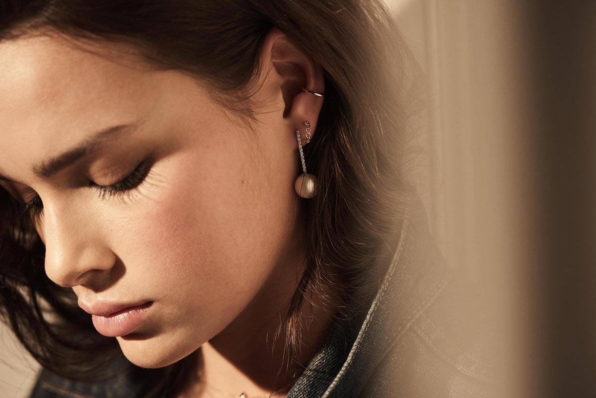 Infinity Heart Huggie Earrings Lifestyle Model