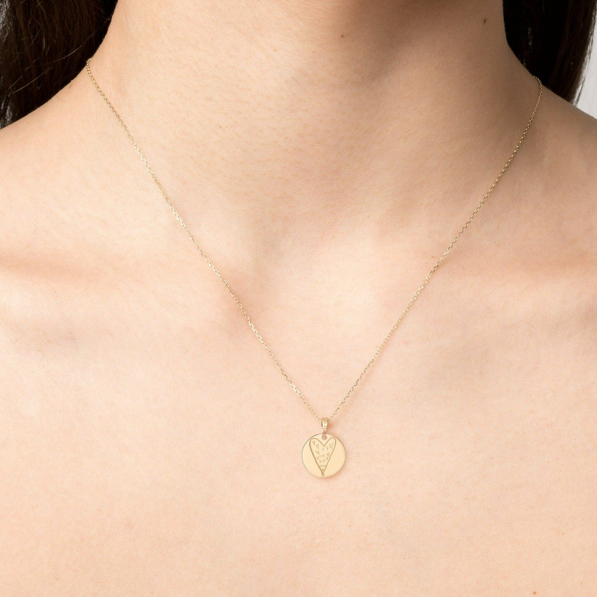 Story in Gold Engraved Pendant