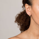 Diamond Crossover Huggie Earrings