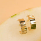 Infinity Huggie Earrings